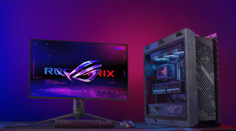 Chasis ROG Strix Helios II junto a un monitor ROG Strix, ambos con iluminación RGB en un fondo oscuro y colorido.