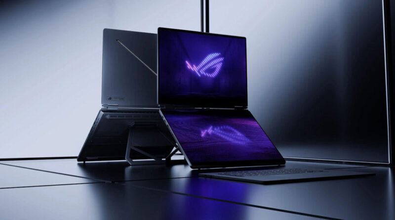 Laptop ASUS ROG Zephyrus Duo 2026 en un fondo negro y gris, mostrando su diseño moderno y doble pantalla iluminada en colores púrpuras.