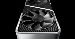 Tarjeta gráfica moderna con diseño elegante, destacando dos ventiladores negros sobre un fondo oscuro, resaltando su estructura y acabado.