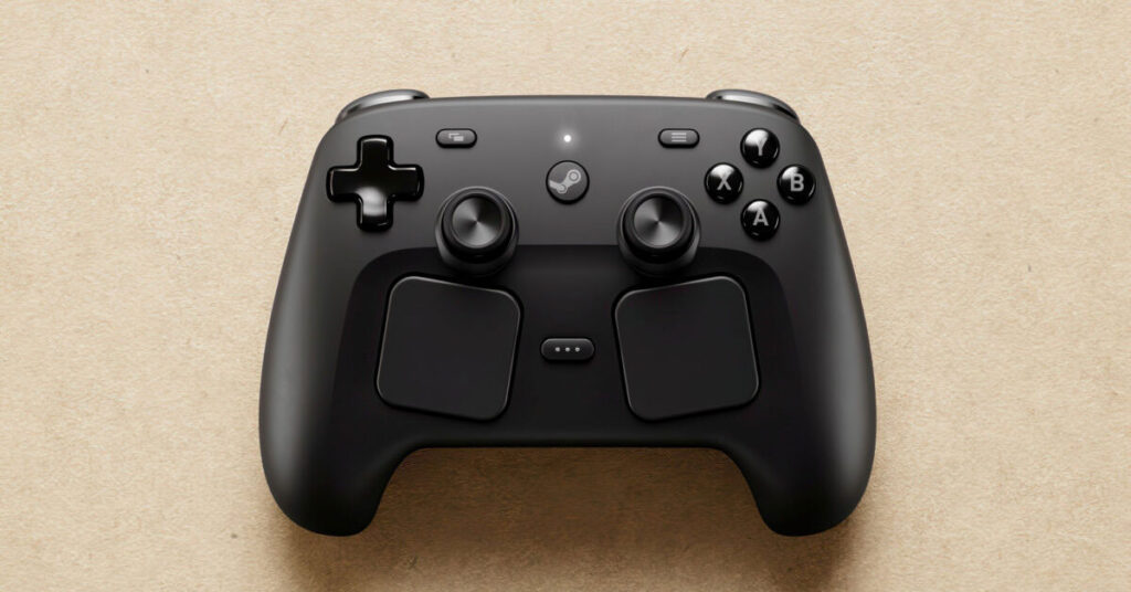 Controlador Steam de color negro sobre un fondo claro, con dos joysticks, botones A, B, y un panel táctil central.