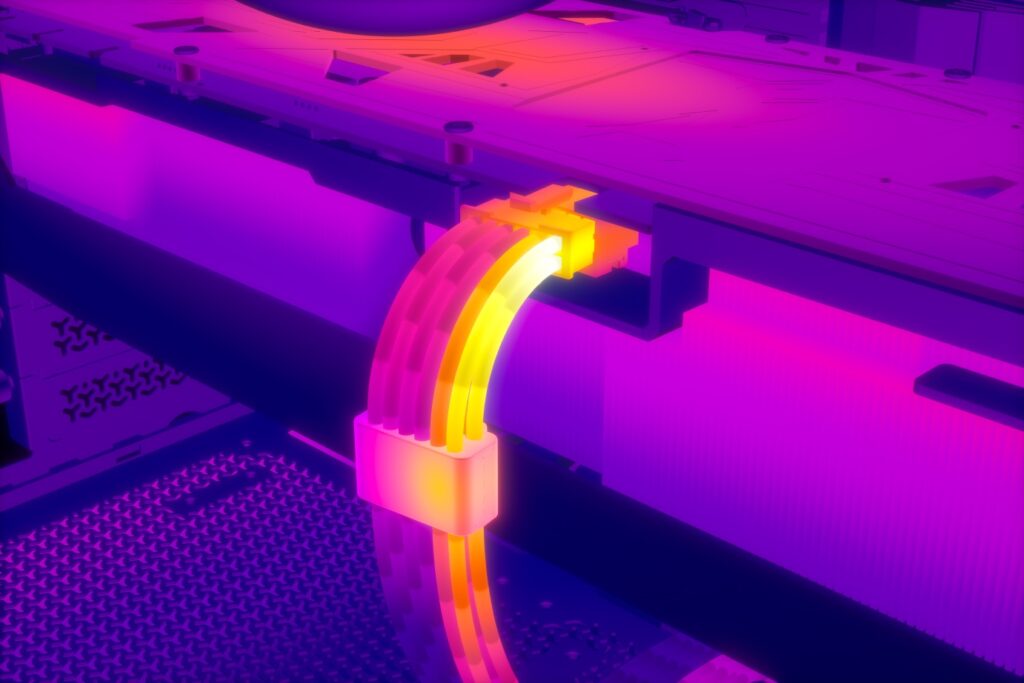 Conector de cable de 16 pines en una GPU, iluminado en tonos púrpura y amarillo, resaltando detalles y diseño del hardware.