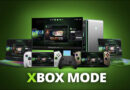 Varios dispositivos como laptops, consoles y un monitor, presentan una interfaz verde brillante de Xbox Mode en un fondo oscuro.