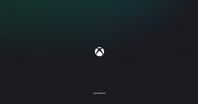 Fondo oscuro con el logo de Xbox centrado en blanco, acompañado del texto "Launching Box" en la parte inferior.