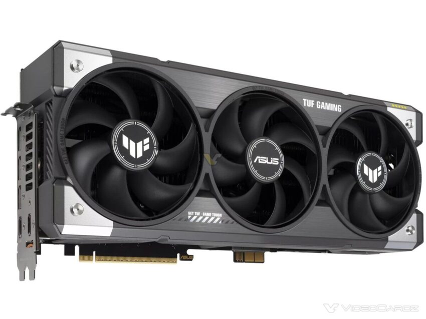 Tarjeta gráfica ASUS TUF Gaming, con tres ventiladores negros y carcasa gris, diseñada para alto rendimiento en gaming.