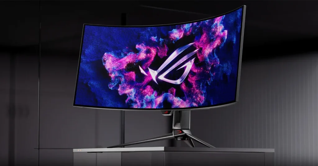 Monitor curvo OLED con fondo colorido y diseño moderno, exhibiendo el logotipo ROG en la pantalla, sobre una base elegante.