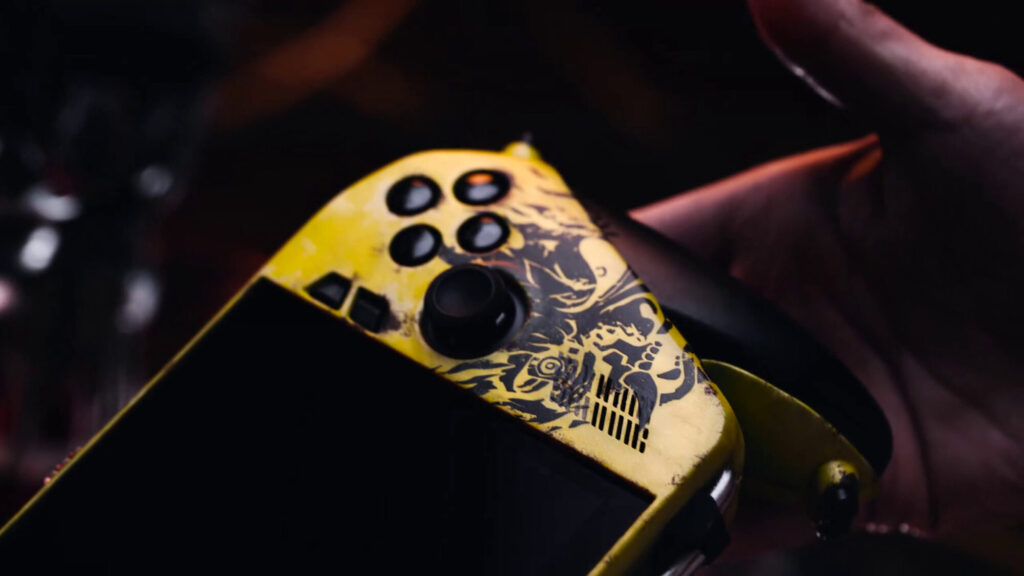 Controlador en tonos amarillos con diseño gráfico de Cyberpunk, destacando botones y un acabado distintivo.