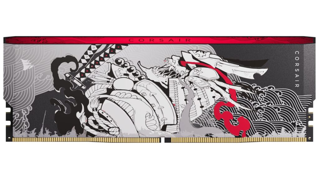 Memoria RAM Corsair SHUGO DDR5 con diseño artístico colorido en negro, rojo y blanco, con motivos de guerrero y elementos abstractos.