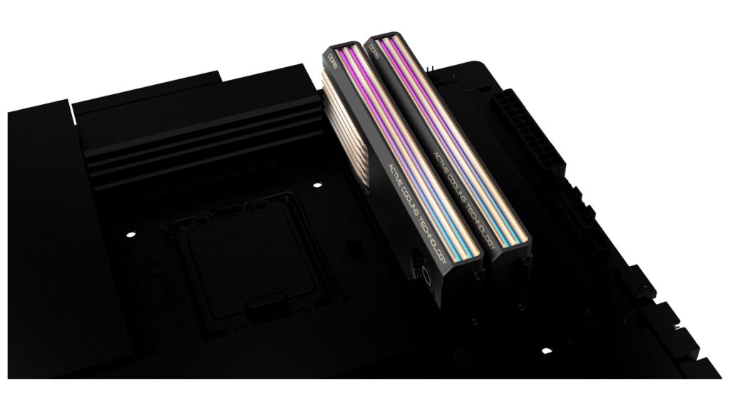 Módulos de memoria DDR5 con ventilador integrado, colores brillantes en las tapas y diseño elegante, sobre una placa base negra.