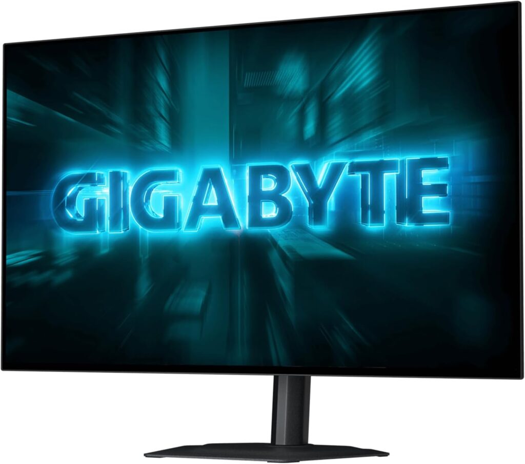 Monitor GIGABYTE de 27 pulgadas con fondo azul brillante, destacando el logotipo "GIGABYTE" en un diseño futurista y tech.