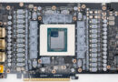 Placa de vídeo GIGABYTE con GPU en el centro, rodeada de circuitos y resistores, en tono negro y gris, con conectores en un lado.