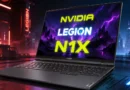 Laptop Lenovo Legion mostrando el logo de NVIDIA y el texto N1X, con un fondo futurista en tonos morados y oscuros.