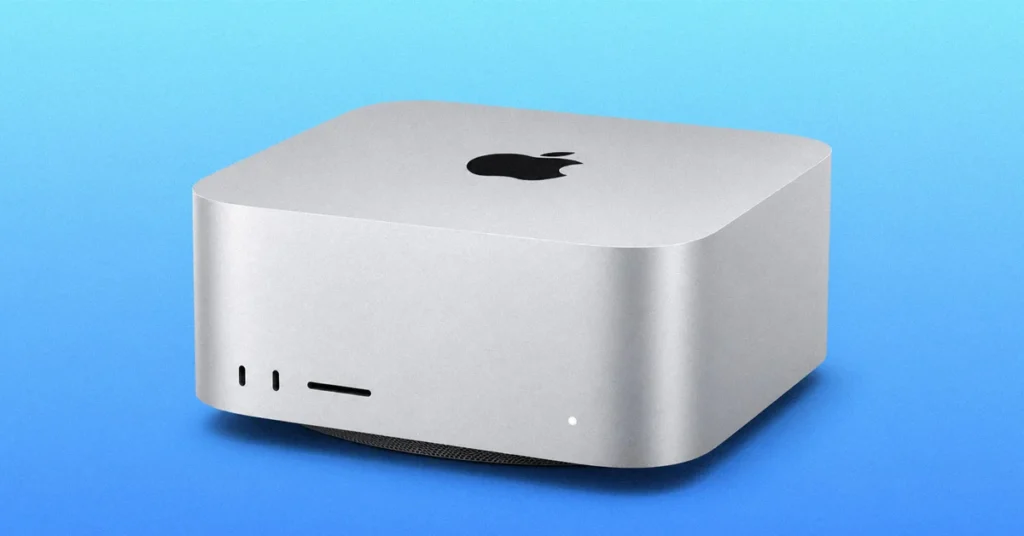 Mac Studio M3 Ultra en acabado plateado, con logotipo de Apple en la parte superior, sobre un fondo azul degradado.