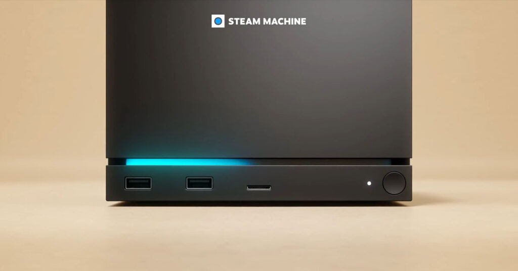 Consola de videojuegos Steam Machine en tonos oscuros, con puertos USB y una luz azul iluminando la parte frontal.