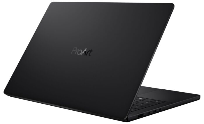 Portátil negro con acabado mate y el logo "ProArt" en la cubierta, mostrando su diseño elegante y moderno.