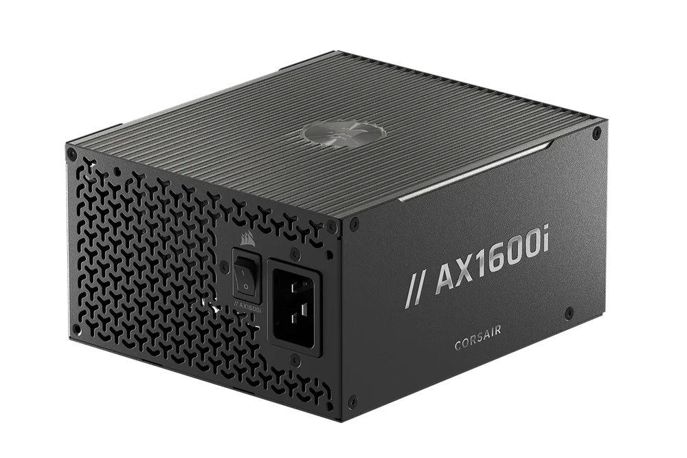 Fuente de alimentación Corsair AX1600i, de color negro con detalles en gris, vista lateral mostrando rejilla de ventilación y conexiones.