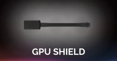 Escudo de GPU en color negro con cables delgados extendiéndose hacia abajo, sobre un fondo gradiente oscuro. Texto "GPU SHIELD" en la parte inferior.