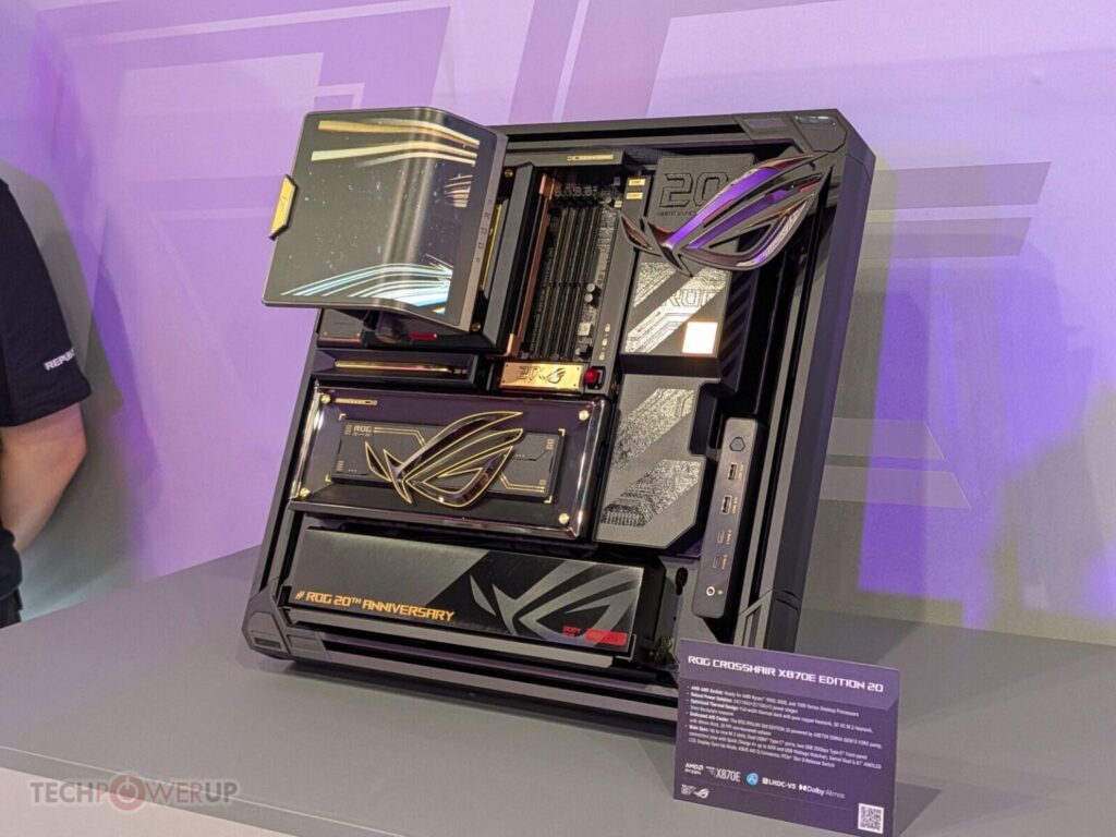 Placa base ROG Crosshair VIII Hero con diseño negro y dorado, con componentes destacados y un panel de vidrio transparente.