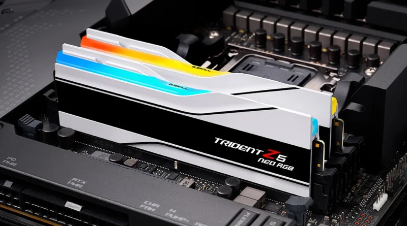 Módulos de RAM DDR5 Trident Z5 Neo RGB en una placa base negra, con disipadores de colores brillantes en la parte superior.