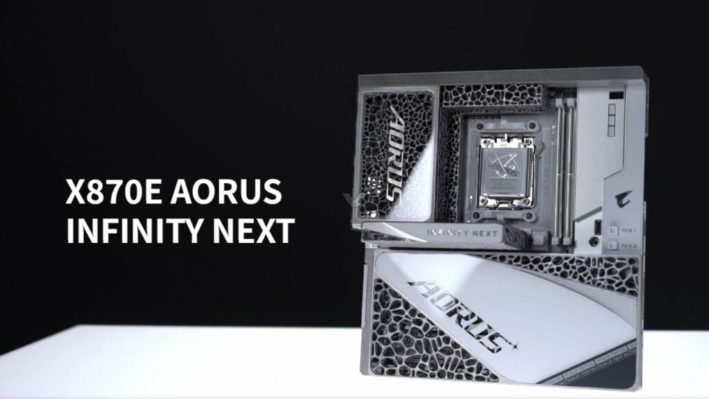 Placa base X870E AORUS con diseño elegante, fondo negro y detalles en plateado y gris, destacando el logotipo AORUS.